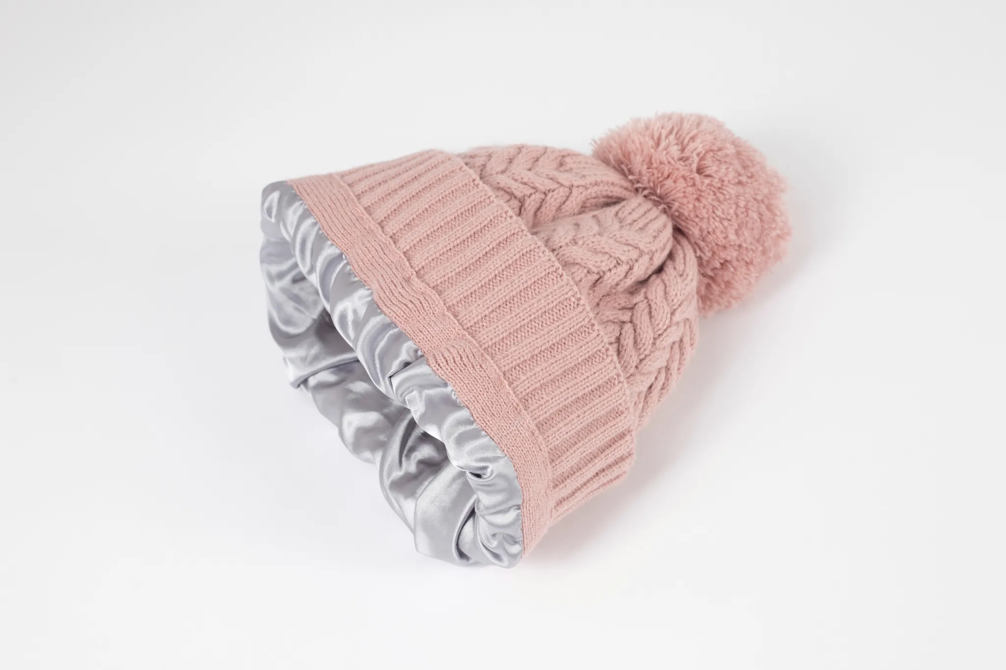 Black Sunrise Dusty Pink Satin-Lined Bobble Hat